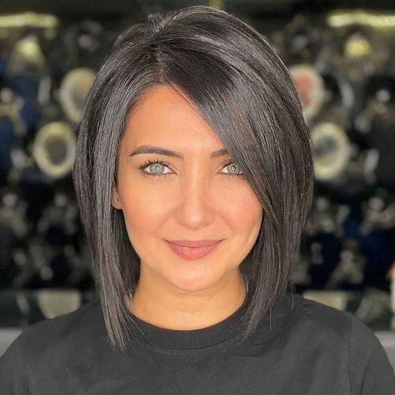Inverted bob hairstyle, Classic inverted bob, Angled bob haircut, Inverted bob for different hair types, Inverted bob face shape compatibility, Customizable inverted bob length, Textured inverted bob, Inverted bob hair color inspiration, Inverted bob transformation,